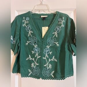 Universal thread embroidered linen top